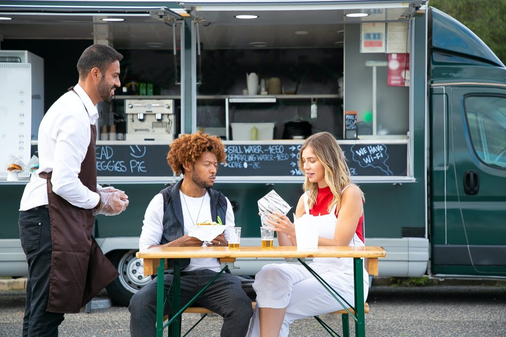 food truck with diners